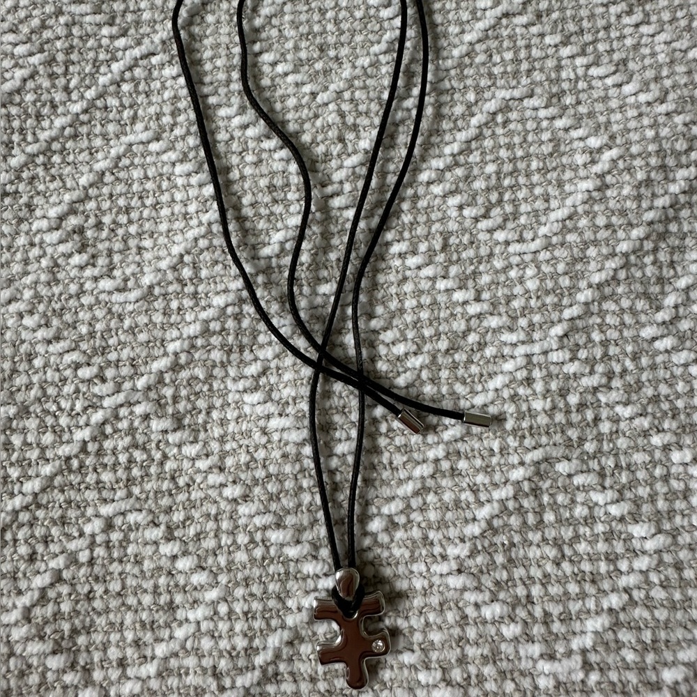 Swarovski crystal silver puzzle piece necklace